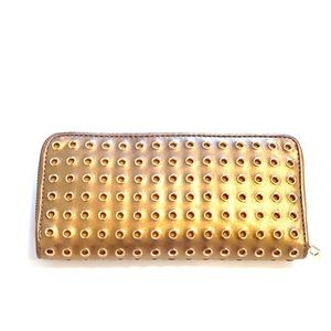 Michael Kors Gold Leather wallet.
